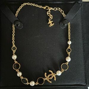 New in box Chanel 24 cruise collection gold, pearl and black short necklace